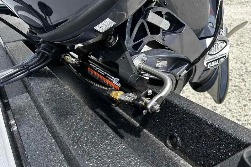 Slide: The Image of Close-up of 2026 Xpress H18 Bay boat engine components and hydraulic system. - 10