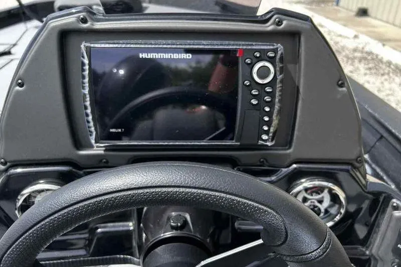 Slide: The Image of Dashboard of 2026 Xpress H18 Bay boat with Humminbird Helix 7 display. - 11