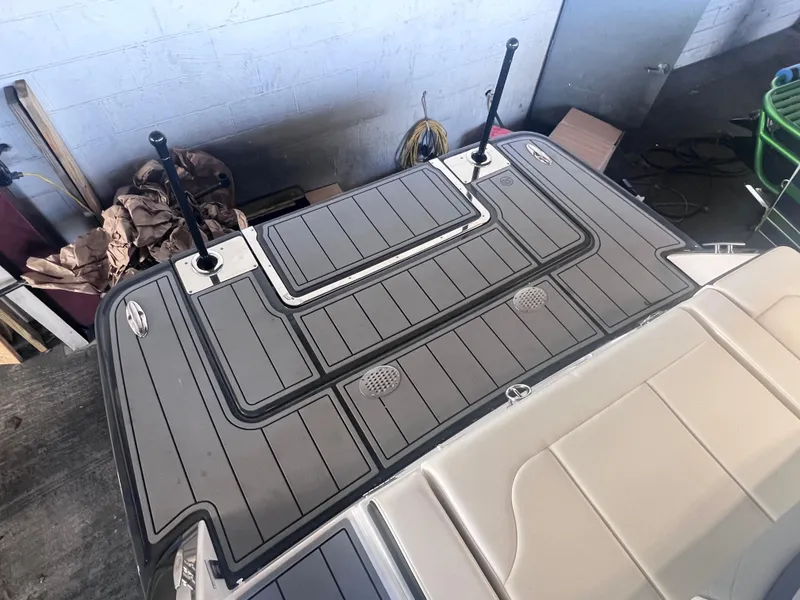 Slide: The Image of 2022 Chaparral 267 SSX boat deck with sleek design and modern features. - 47