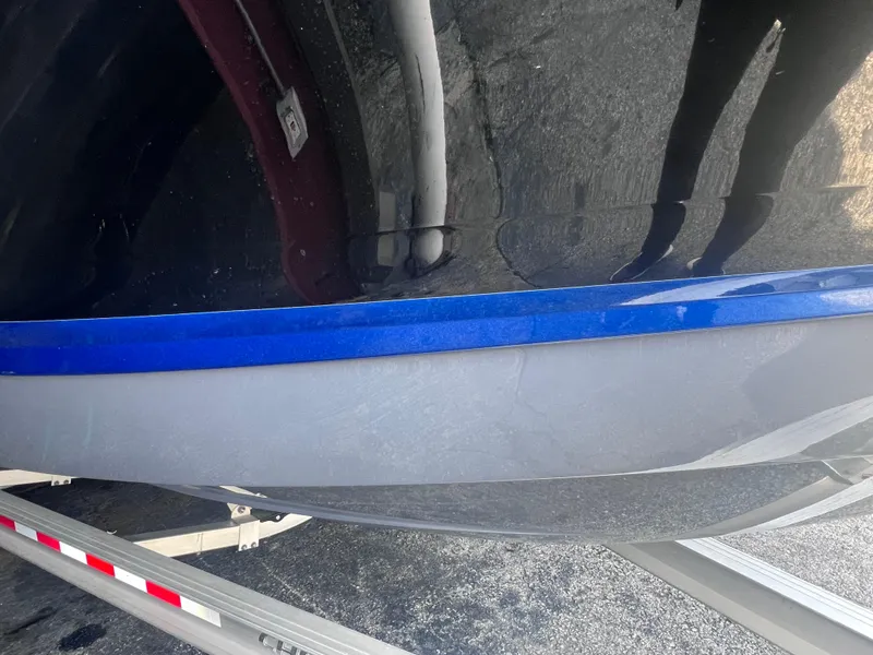 Slide: The Image of 2022 Chaparral 267 SSX boat hull on trailer. - 9