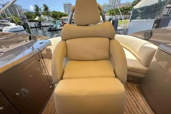 Slide: The Image of Luxurious seating on 2005 Riva RivaRama 44 yacht, docked in a marina. - 10