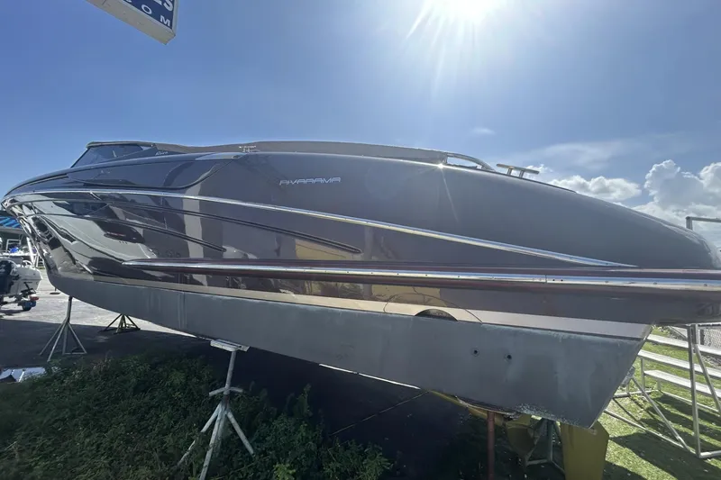 Slide: The Image of 2005 Riva RivaRama 44 luxury yacht displayed under bright sunlight. - 13