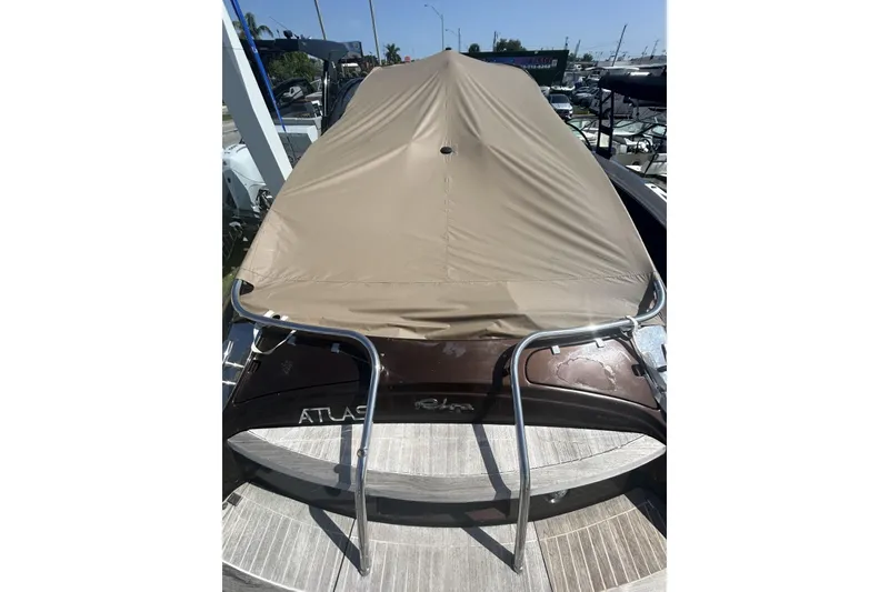 Slide: The Image of 2005 Riva RivaRama 44 boat with protective cover, docked in marina. - 15