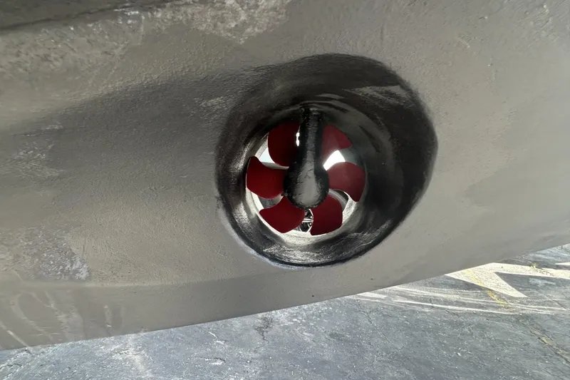 Slide: The Image of Close-up of a 2005 Riva RivaRama 44 boat's red propeller in a tunnel. - 19