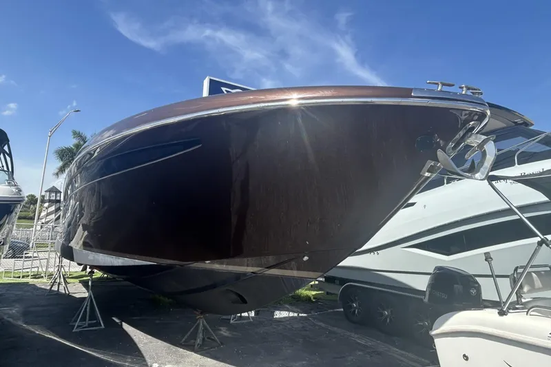 Slide: The Image of 2005 Riva RivaRama 44 luxury yacht displayed outdoors under clear blue sky. - 20