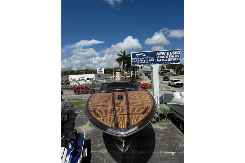 Slide: The Image of 2005 Riva RivaRama 44 boat displayed at Miami Boat Place under clear skies. - 26