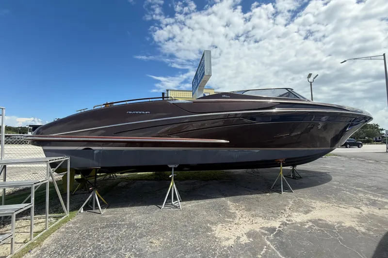 Slide: The Image of 2005 Riva RivaRama 44 luxury yacht on display under a partly cloudy sky. - 31