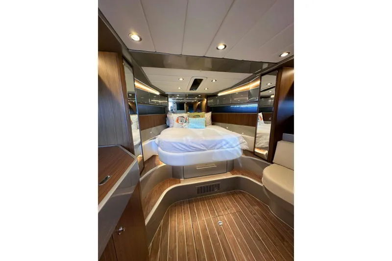 Slide: The Image of Luxurious interior of 2005 Riva RivaRama 44 yacht with elegant wood finishes. - 4