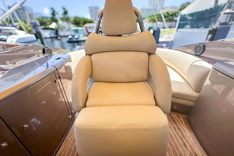 Slide: The Image of Luxurious seating on a 2005 Riva RivaRama 44 yacht, featuring elegant beige upholstery. - 6