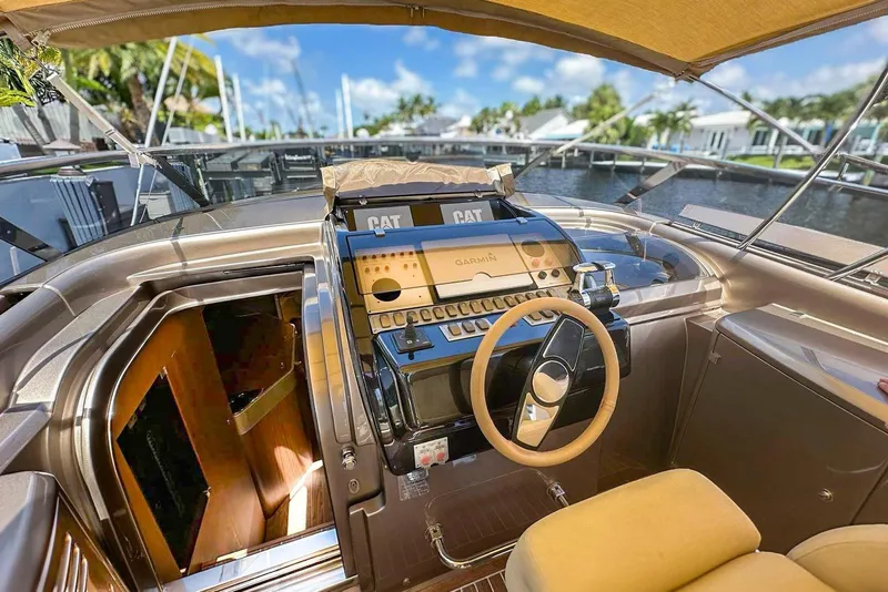 Slide: The Image of 2005 Riva RivaRama 44 yacht cockpit with steering wheel and navigation equipment. - 9
