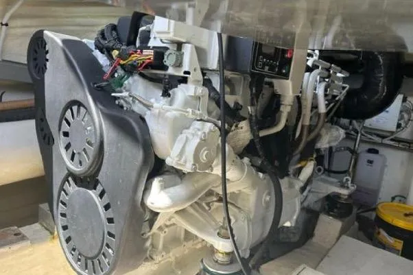 Slide: The Image of Engine compartment of a 2005 Riva RivaRama 44 boat, showcasing mechanical components. - 24