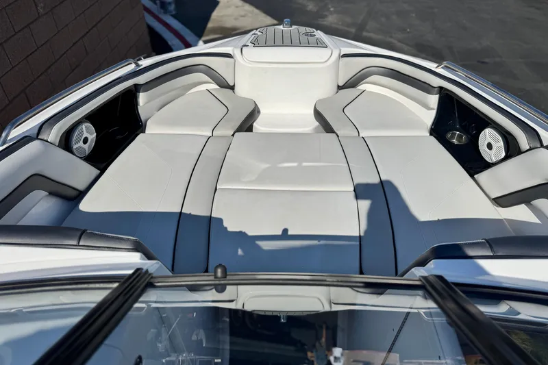 Slide: The Image of 2020 Yamaha Boats AR240 interior with spacious seating and modern design. - 14