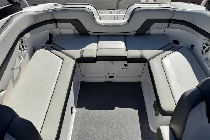 Slide: The Image of 2020 Yamaha Boats AR240 interior with spacious seating and modern design. - 18