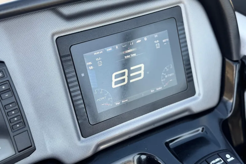Slide: The Image of Dashboard display of 2020 Yamaha Boats AR240 showing speed and fuel levels. - 31