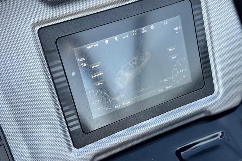 Slide: The Image of Dashboard display of a 2020 Yamaha Boats AR240, showing fuel and navigation details. - 33