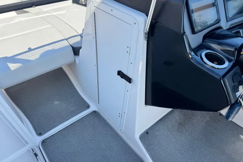 Slide: The Image of 2020 Yamaha Boats AR240 interior with dashboard and seating area. - 37