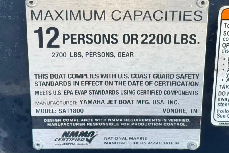 Slide: The Image of Yamaha AR240 2020 capacity plate, 12 persons or 2200 lbs, safety compliance details. - 39