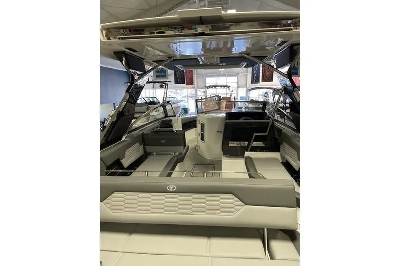 Slide: The Image of 2021 Cobalt A29 boat interior with modern seating and sleek design. - 10