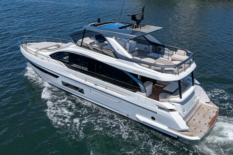 Slide: The Image of 2026 Azimut Fly 72 luxury yacht cruising on open water. - 1