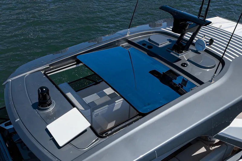 Slide: The Image of 2026 Azimut Fly 72 yacht with sleek design and modern features on the water. - 23