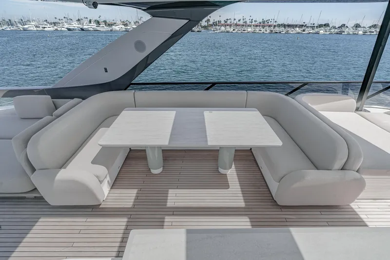Slide: The Image of Luxurious seating area on 2026 Azimut Fly 72 yacht with ocean view. - 30