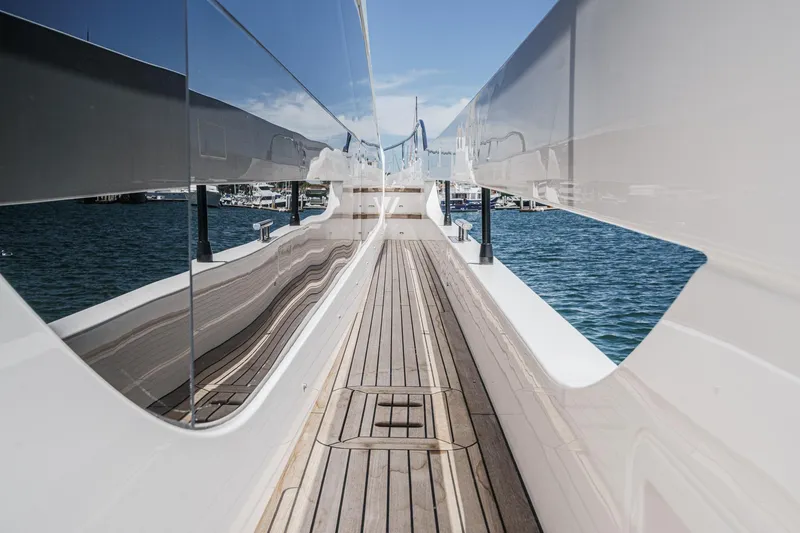 Slide: The Image of Side deck view of 2026 Azimut Fly 72 yacht, featuring sleek design and wooden flooring. - 37