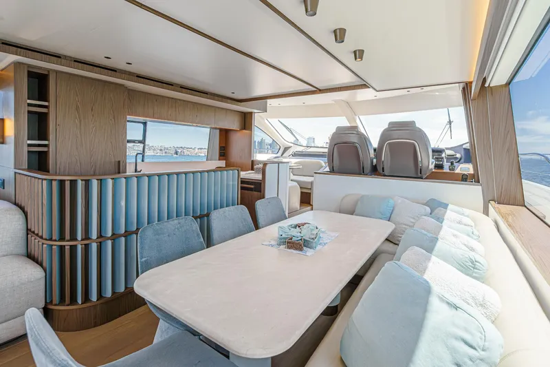 Slide: The Image of Luxurious interior of 2026 Azimut Fly 72 yacht with elegant dining area and panoramic views. - 47