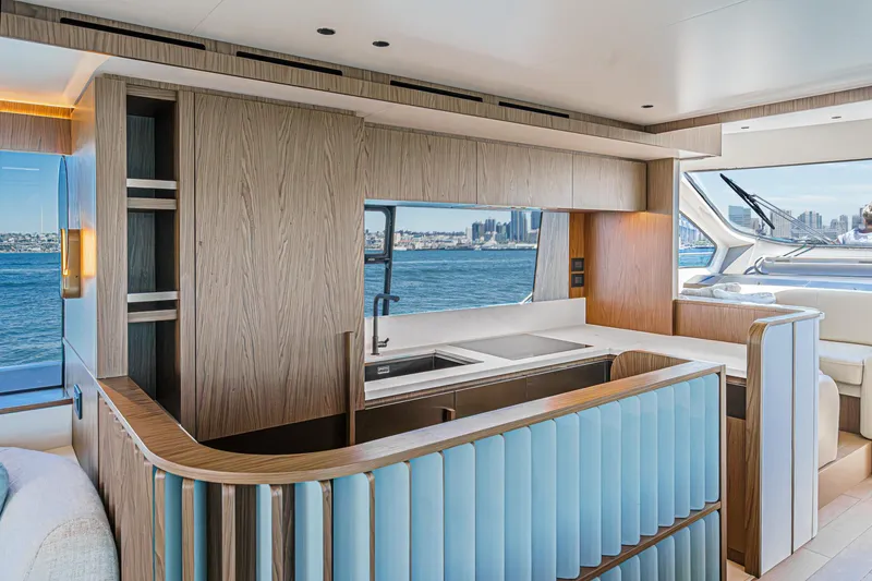 Slide: The Image of Luxurious interior of 2026 Azimut Fly 72 yacht with modern kitchen and ocean view. - 48