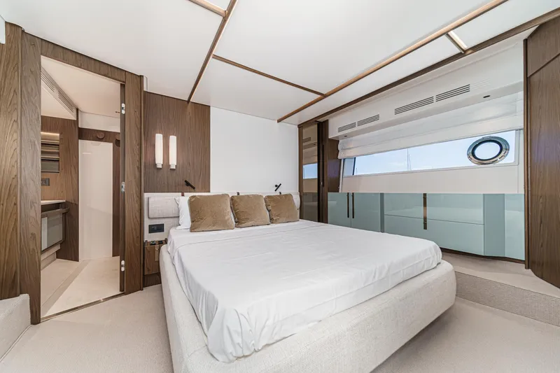 Slide: The Image of Luxurious bedroom interior of 2026 Azimut Fly 72 yacht with modern design and elegant furnishings. - 56