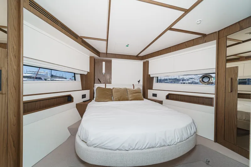 Slide: The Image of Luxurious bedroom interior of 2026 Azimut Fly 72 yacht with modern design elements. - 60