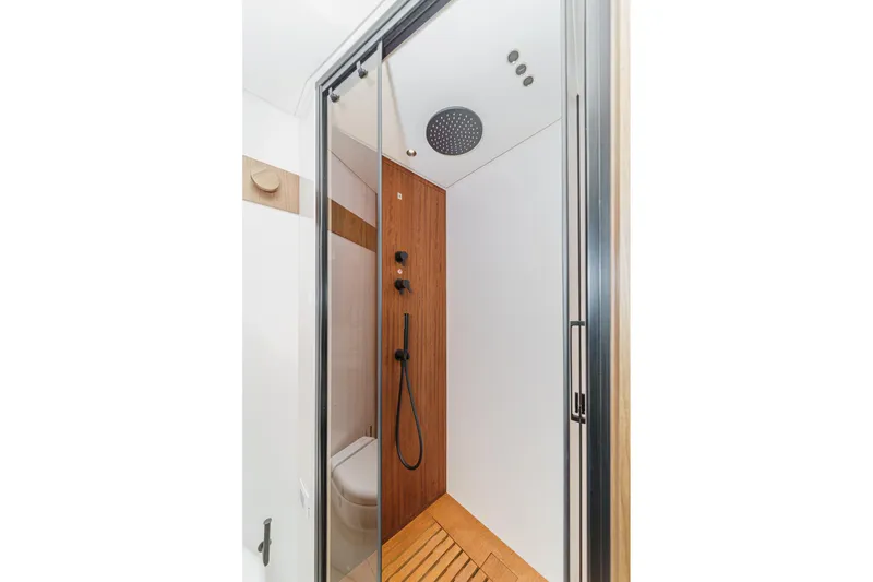 Slide: The Image of Modern shower in 2026 Azimut Fly 72 yacht with wood accents and sleek design. - 63