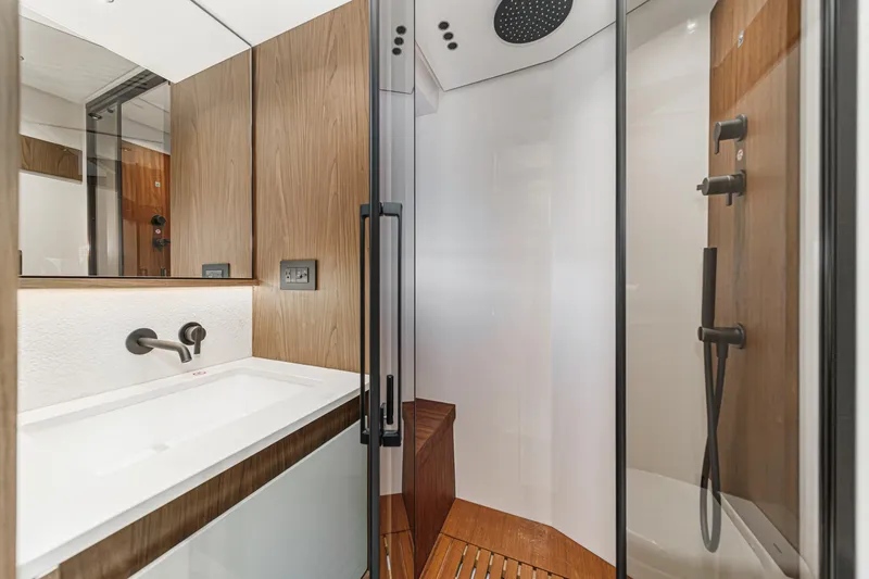 Slide: The Image of Luxurious bathroom in 2026 Azimut Fly 72 yacht with modern shower and sleek design. - 70
