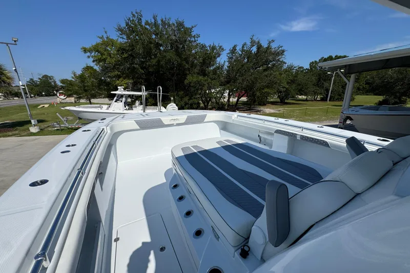 Slide: The Image of Luxurious 2026 Invincible 46 Catamaran with spacious deck and comfortable seating. - 24