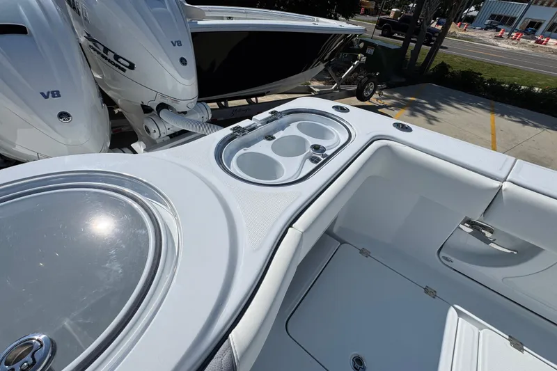 Slide: The Image of 2026 Invincible 46 Catamaran with dual V8 engines and sleek deck design. - 48