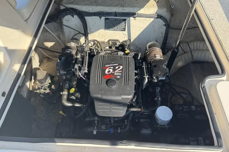 Slide: The Image of 2007 Rinker 282 boat engine compartment with MerCruiser 6.2 MPI engine. - 8