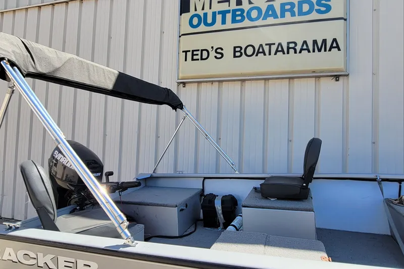 Slide: The Image of 2010 Tracker Guide V 15 Laker boat at Ted's Boatarama dealership. - 17