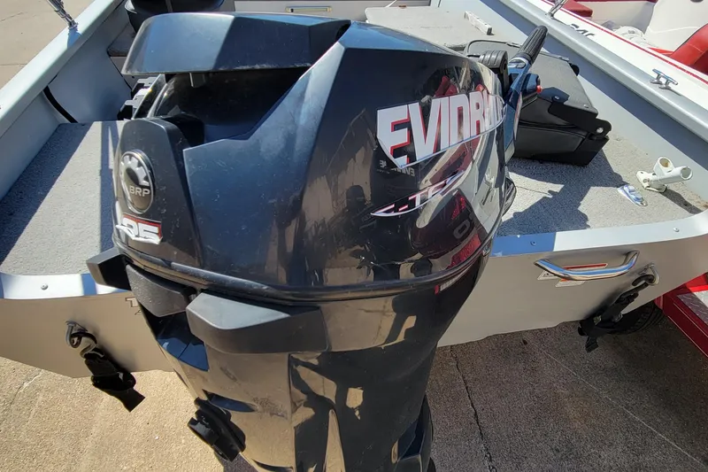 Slide: The Image of 2010 Tracker Guide V 15 Laker boat with Evinrude outboard motor. - 5