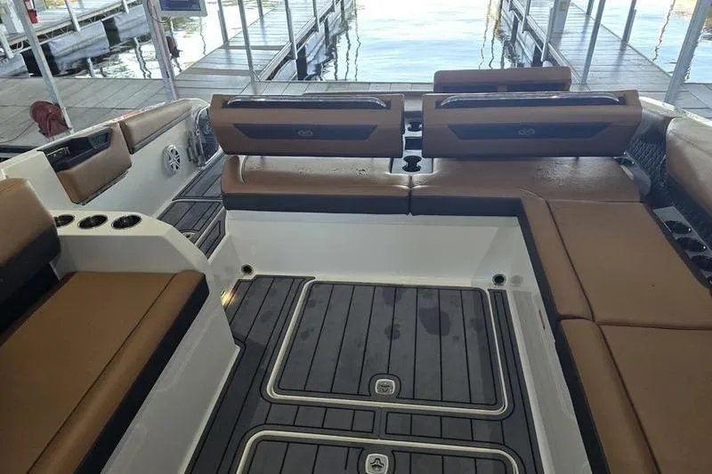 Slide: The Image of Luxury interior of 2026 Cobalt R31 boat with brown seating and sleek flooring. - 6
