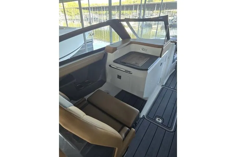 Slide: The Image of 2026 Cobalt R31 boat interior with sleek seating and modern design. - 7