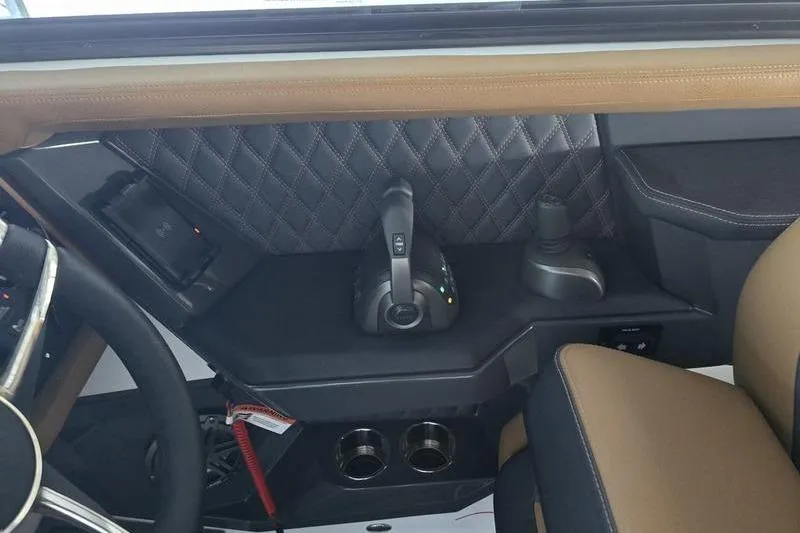 Slide: The Image of Interior of 2026 Cobalt R31 boat with modern controls and quilted paneling. - 9