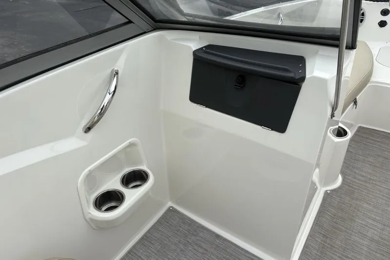 Slide: The Image of Interior of 2017 Stingray 191DC O/B boat with cup holders and storage compartment. - 20