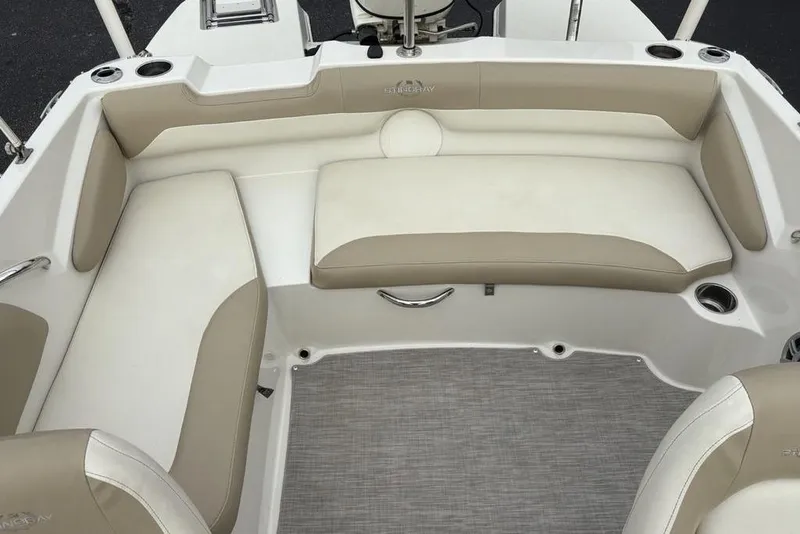 Slide: The Image of 2017 Stingray 191DC O/B boat interior with beige and white seating. - 21
