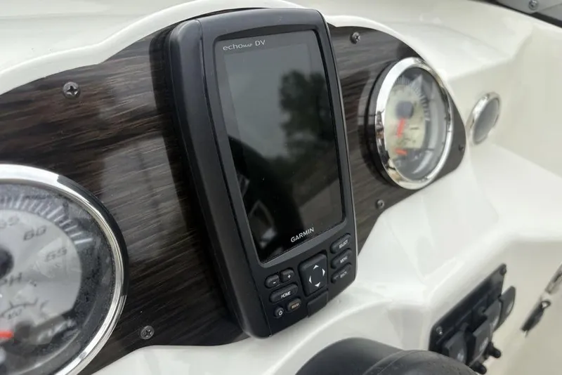 Slide: The Image of Dashboard of 2017 Stingray 191DC O/B with Garmin echomap DV and gauges. - 25