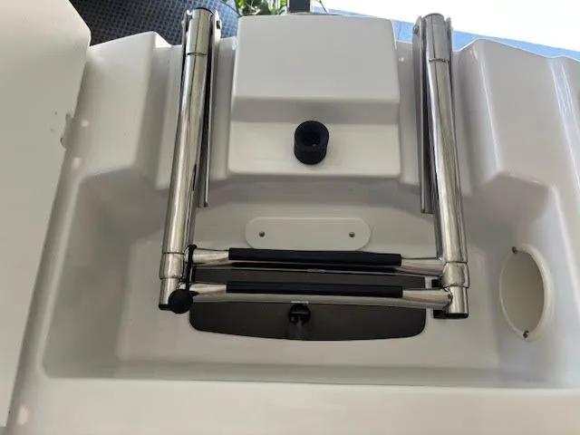 Slide: The Image of 2026 Stingray 211DC boat ladder and platform detail. - 21