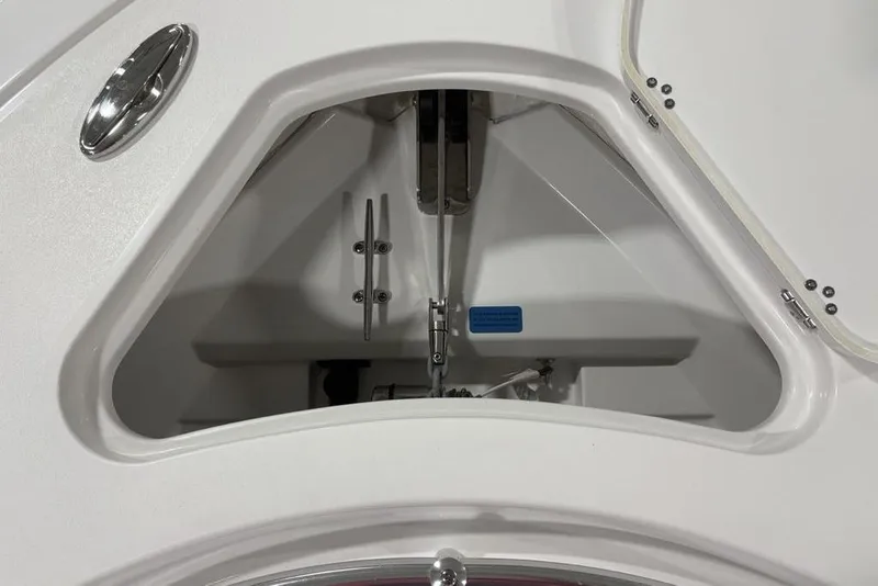 Slide: The Image of Anchor storage compartment of 2026 Sportsman Open 232 Center Console boat. - 12