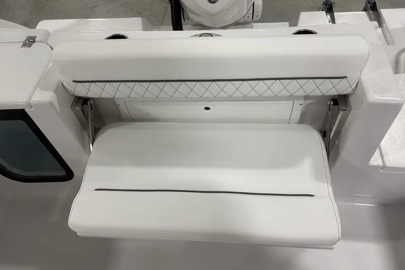 Slide: The Image of 2026 Sportsman Open 232 Center Console boat seat, white with diamond stitching. - 25