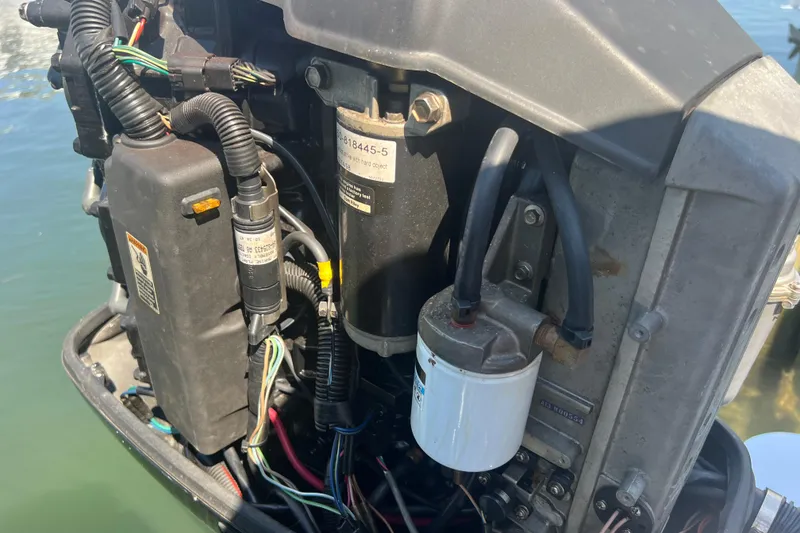 Slide: The Image of Close-up of a 1999 Wellcraft 302 Scarab Sport boat engine components. - 38