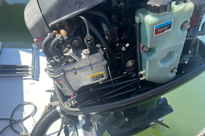 Slide: The Image of Close-up of a 1999 Wellcraft 302 Scarab Sport boat engine components. - 42