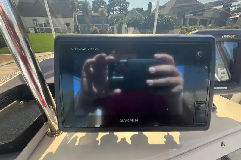 Slide: The Image of Garmin GPSMAP 741xs on 1999 Wellcraft 302 Scarab Sport boat dashboard. - 46