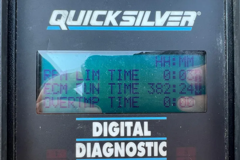 Slide: The Image of Digital diagnostic display on a 1999 Wellcraft 302 Scarab Sport boat. - 70